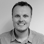 Black and white photo of Brett Macdonald - CEO and Co-Founder