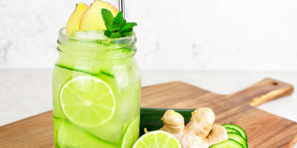 lime mocktail in a jar on a wooden board